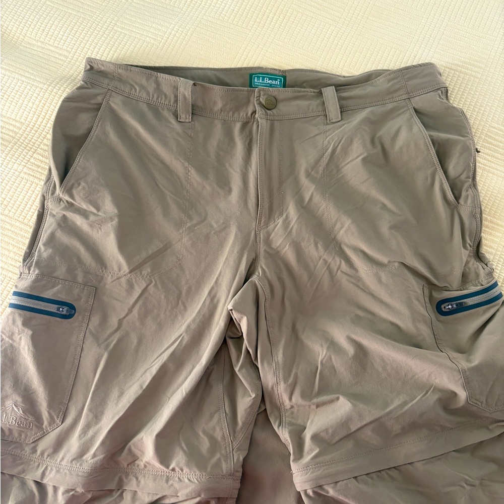 Men’s LLBean hiking pants with zip off legs. Rips top nylon spandex. 
Size 38/36